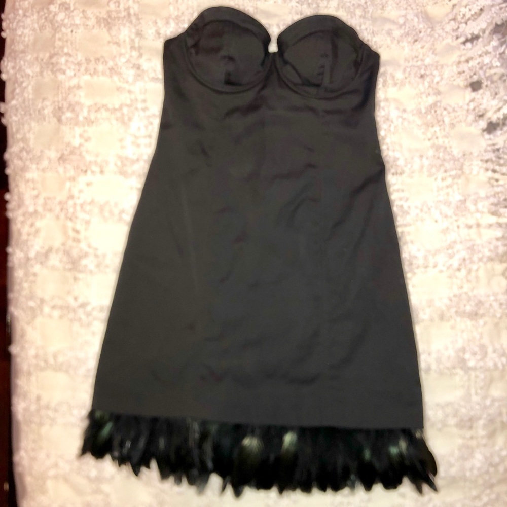 Black satin strapless feather dress